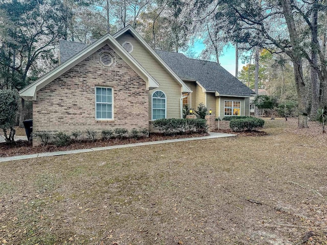 view of front of property with brick siding