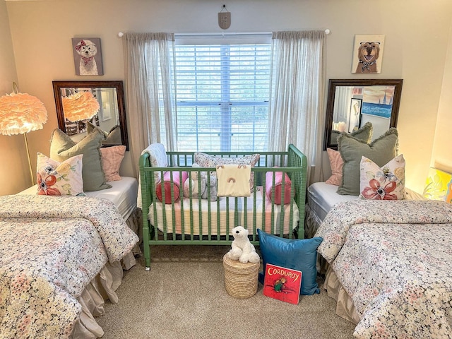 bedroom featuring carpet