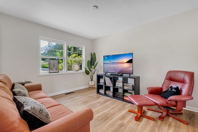2117 Gibbs Dr, Tallahassee, FL 32303 - living room with wood finished floors and baseboards