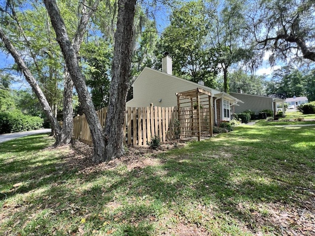 view of home's exterior featuring a yard