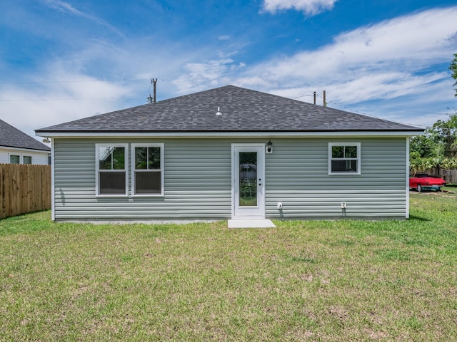 42 Duane Dr, Crawfordville, FL 32327 - rear view of house featuring a shingled roof