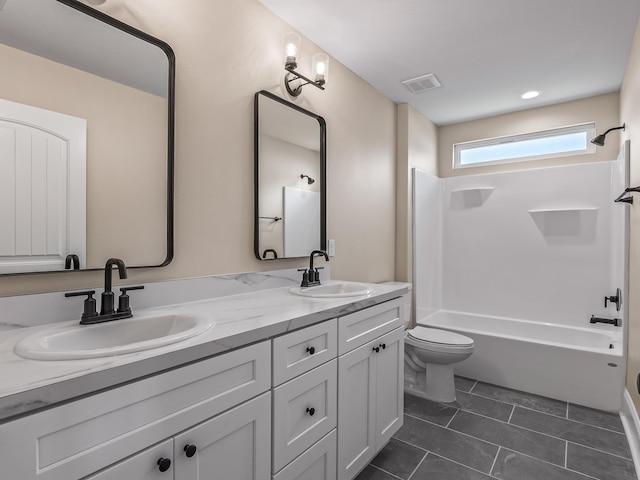 42 Duane Dr, Crawfordville, FL 32327 - bathroom with double vanity, shower / washtub combination, and tile patterned floors