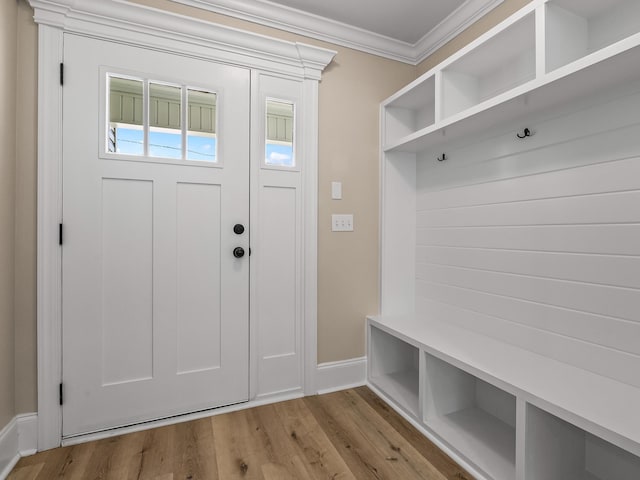 42 Duane Dr, Crawfordville, FL 32327 - mudroom with crown molding and light wood-style flooring