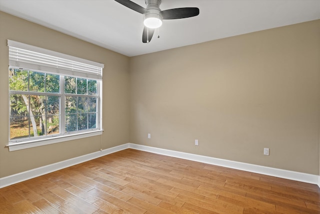 empty room featuring light hardwood / wood-style floors and ceiling fan