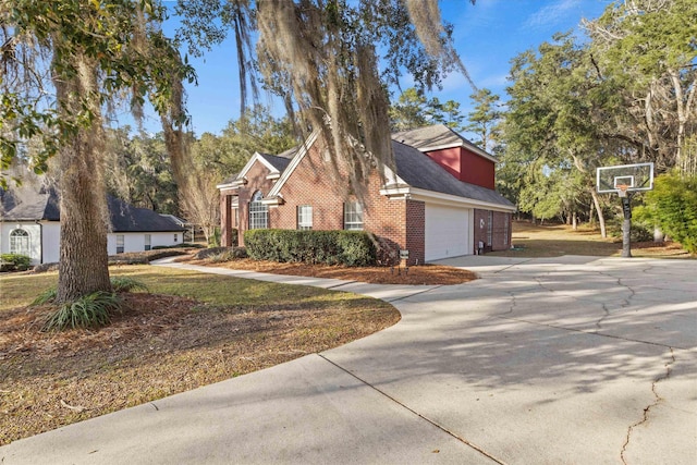 view of side of home featuring a garage