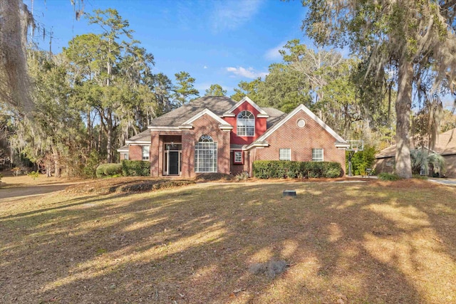 view of property featuring a front yard