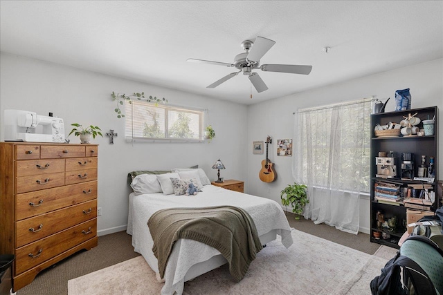 615621 N Woodward Ave -, Unit Tallahassee, FL 32304 - carpeted bedroom with a ceiling fan