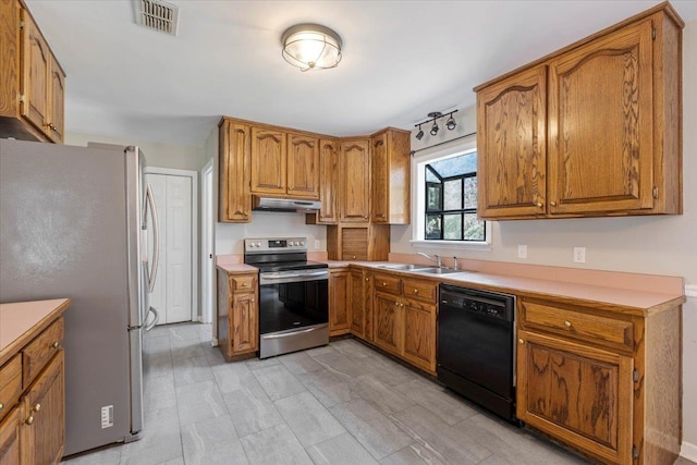 kitchen featuring sink and appliances with stainless steel finishes