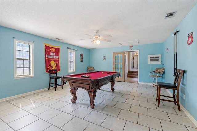 rec room featuring an AC wall unit, a textured ceiling, ceiling fan, and billiards