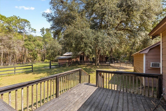 deck with an outbuilding and a lawn