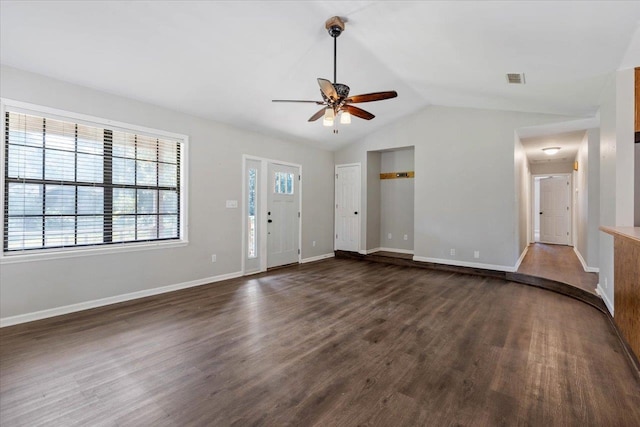 unfurnished living room with dark hardwood / wood-style flooring, vaulted ceiling, and ceiling fan