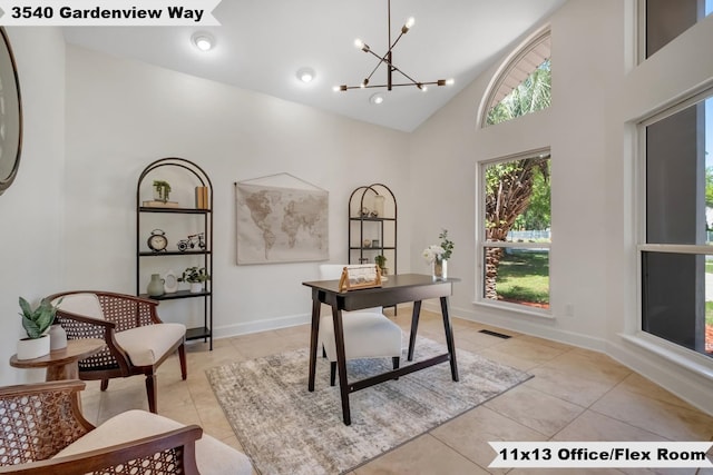 tiled office space with high vaulted ceiling and a notable chandelier