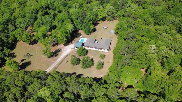 bird's eye view with a forest view