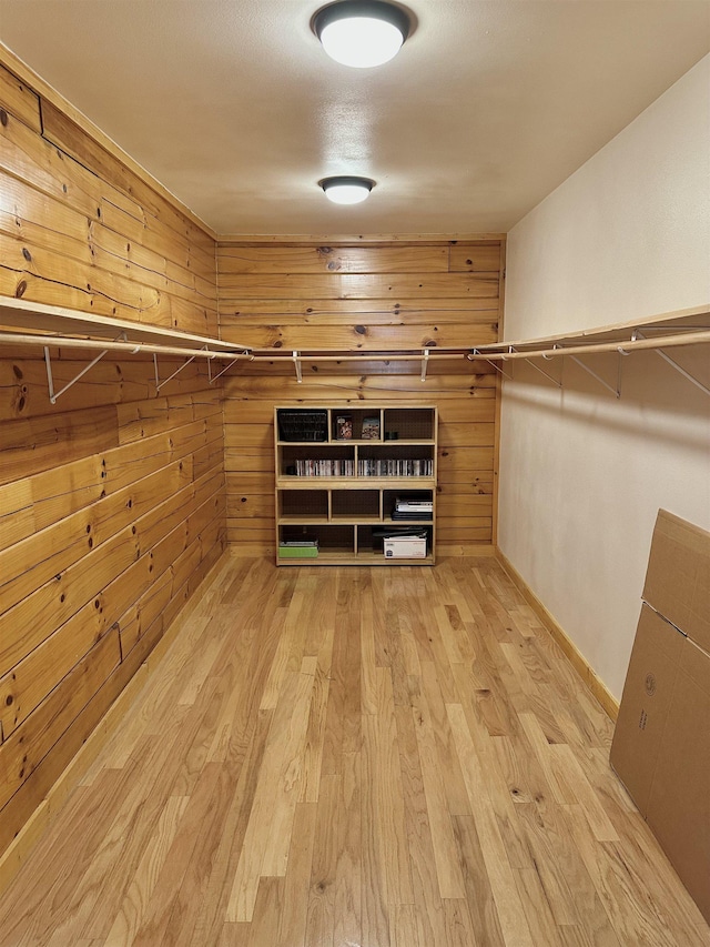 walk in closet featuring light wood-type flooring