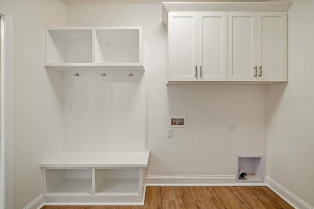 mudroom with light hardwood / wood-style floors