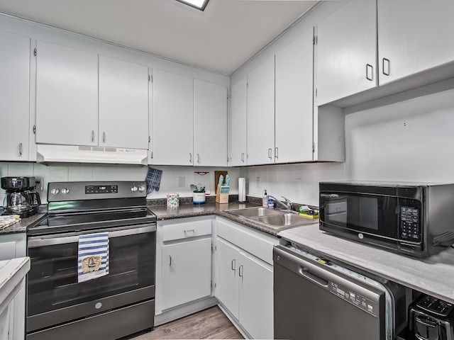 kitchen featuring dishwasher, white cabinetry, stainless steel range with electric stovetop, and sink