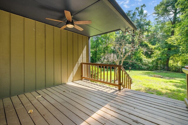 6427 Count Turf Trl, Tallahassee, FL 32309 - wooden terrace with a ceiling fan, a lawn, and view of scattered trees