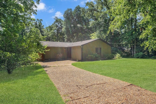 6427 Count Turf Trl, Tallahassee, FL 32309 - view of front of property with concrete driveway and a front lawn