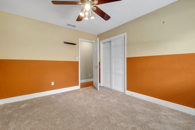 6427 Count Turf Trl, Tallahassee, FL 32309 - unfurnished bedroom featuring carpet floors, a closet, baseboards, and a ceiling fan