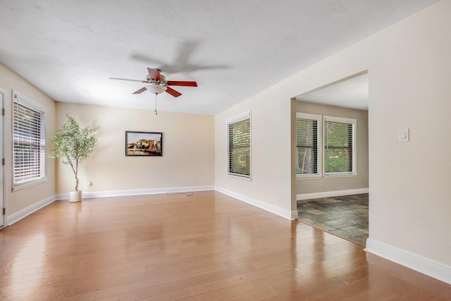 6427 Count Turf Trl, Tallahassee, FL 32309 - empty room featuring ceiling fan, light wood-style flooring, and baseboards