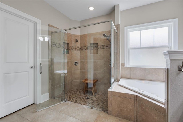 2642 Opequon Bnd, Tallahassee, FL 32312 - bathroom featuring a stall shower, a bath, and tile patterned flooring