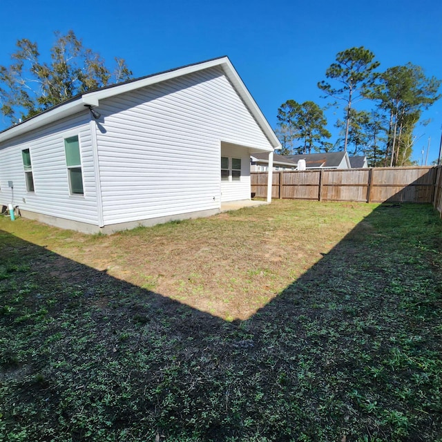 view of home's exterior featuring a lawn