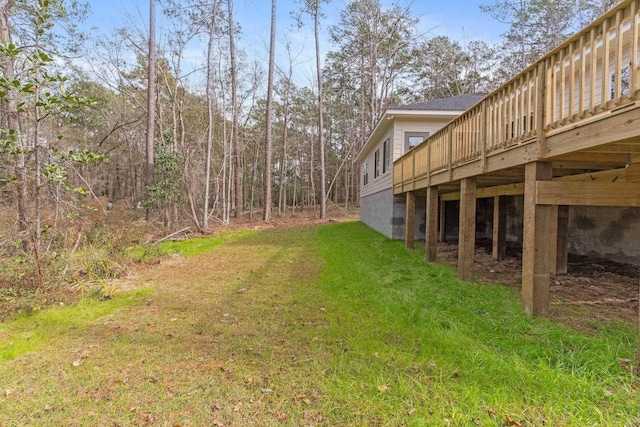 view of yard featuring a wooden deck