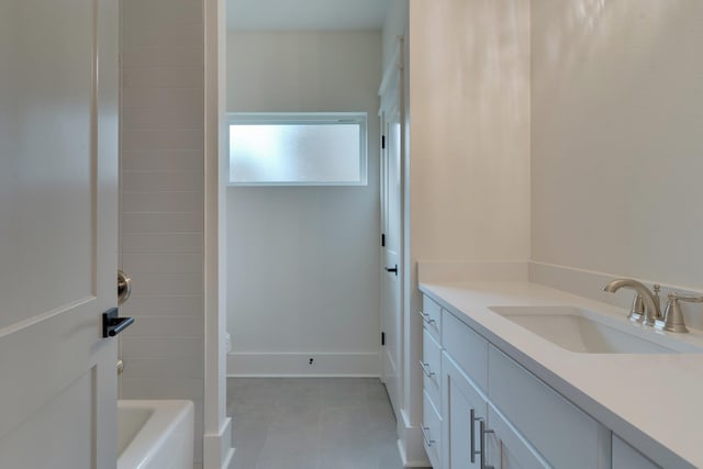 bathroom with independent shower and bath, tile patterned floors, and vanity