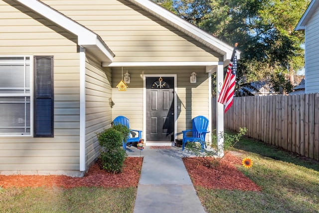 property entrance with covered porch