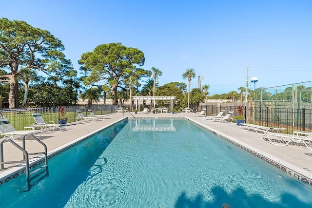 view of pool featuring a pergola and a patio