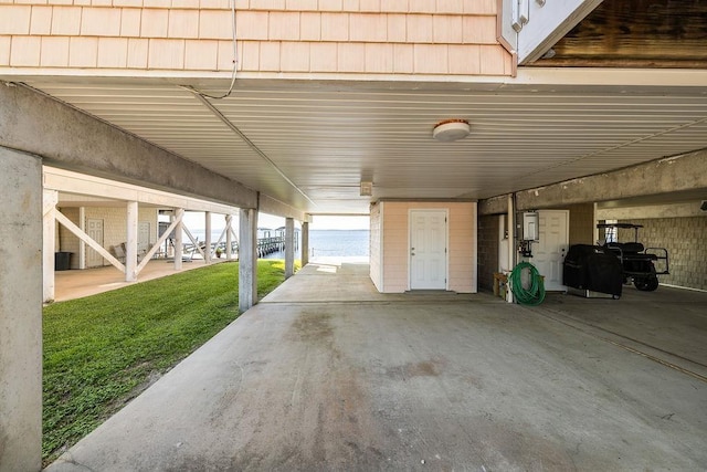 view of patio / terrace featuring a water view and grilling area