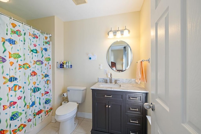 bathroom with tile patterned flooring, vanity, toilet, and curtained shower