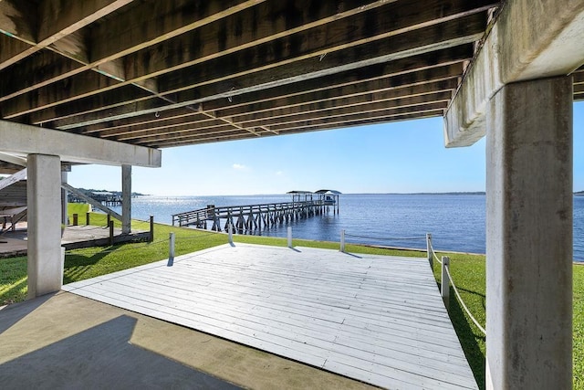 dock area with a water view