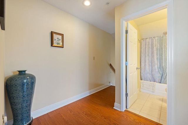 corridor featuring light hardwood / wood-style flooring