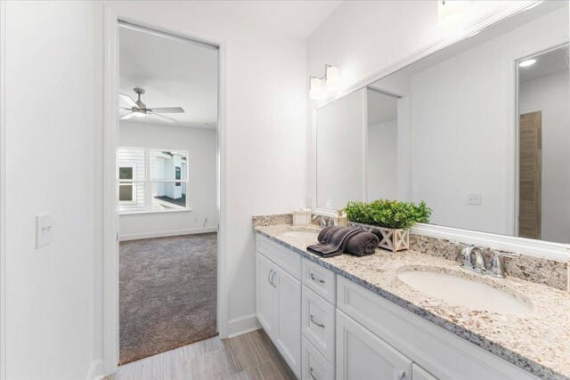 bathroom with vanity and ceiling fan