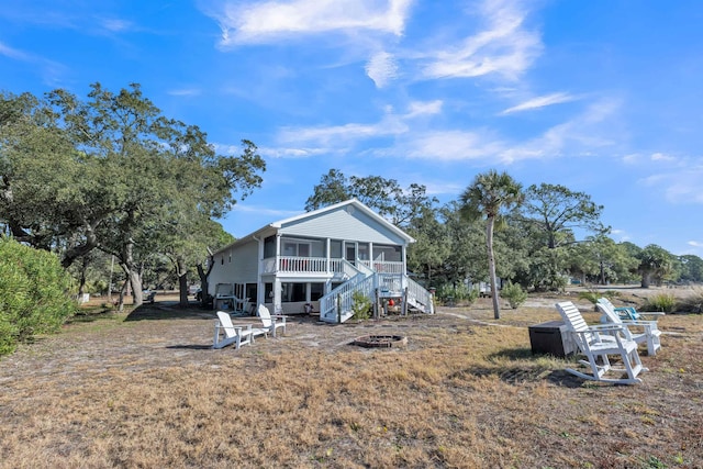 view of front facade with a sunroom