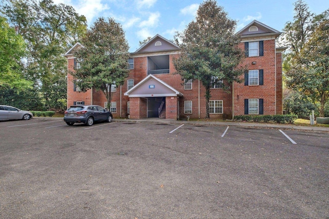 3000 S Adams St Unit 111, Tallahassee, FL 32301 - view of building exterior with uncovered parking