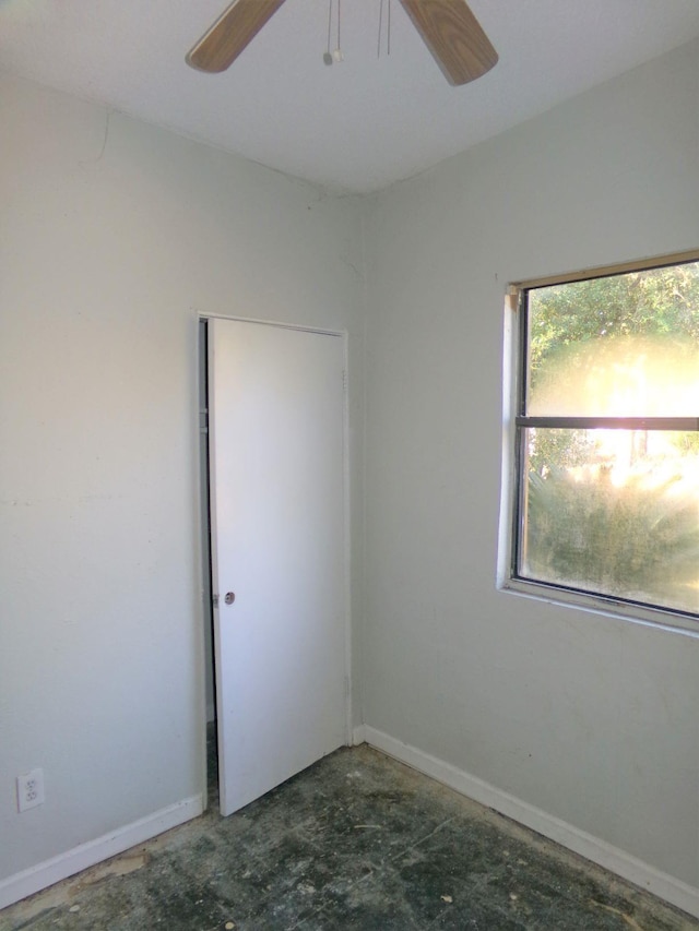 unfurnished room featuring ceiling fan