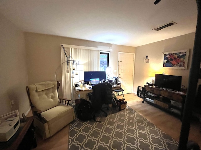 home office featuring light hardwood / wood-style flooring