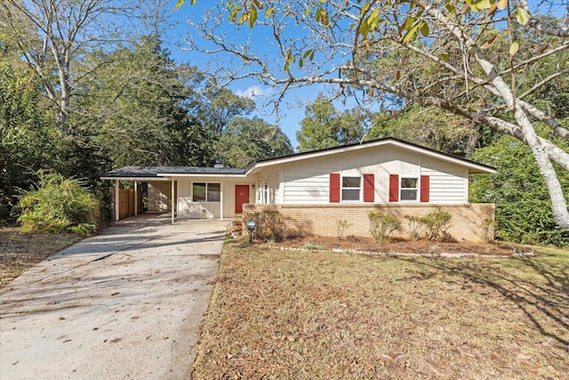 single story home with a carport