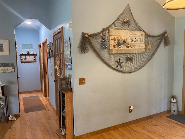 hallway featuring hardwood / wood-style flooring