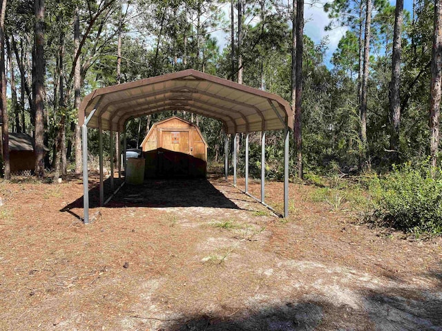 view of vehicle parking with a carport