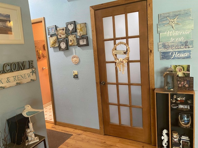 doorway featuring light hardwood / wood-style floors