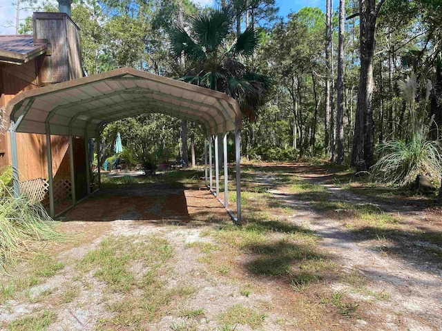 exterior space featuring a carport