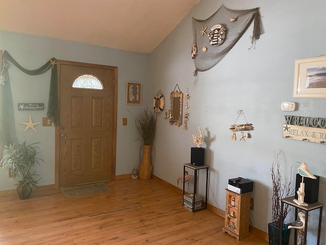 foyer entrance with light wood-type flooring