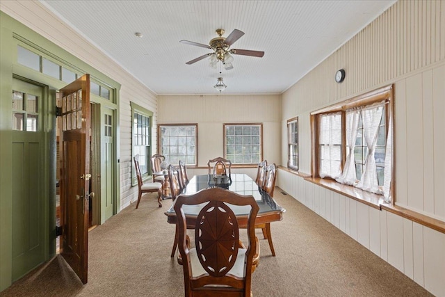 315 W Green St, Perry, FL 32347 - carpeted dining room with a ceiling fan and crown molding