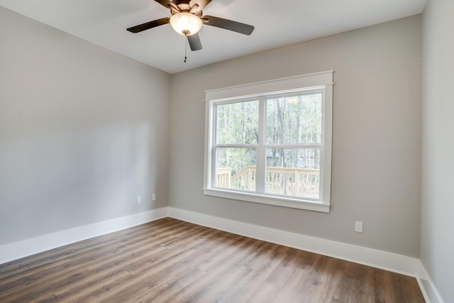 unfurnished room featuring ceiling fan and wood-type flooring