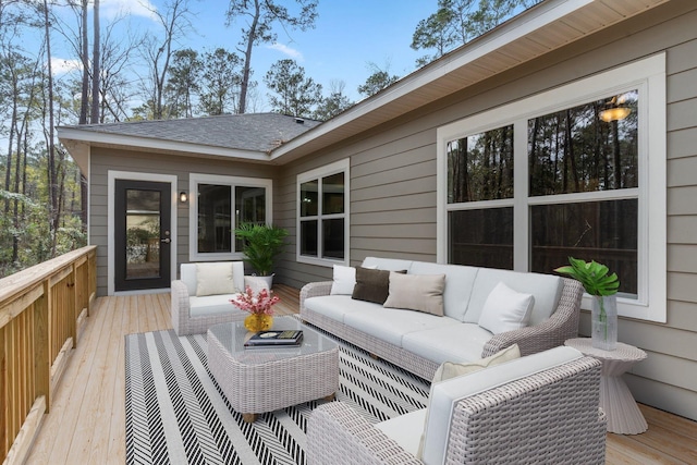 wooden deck featuring outdoor lounge area