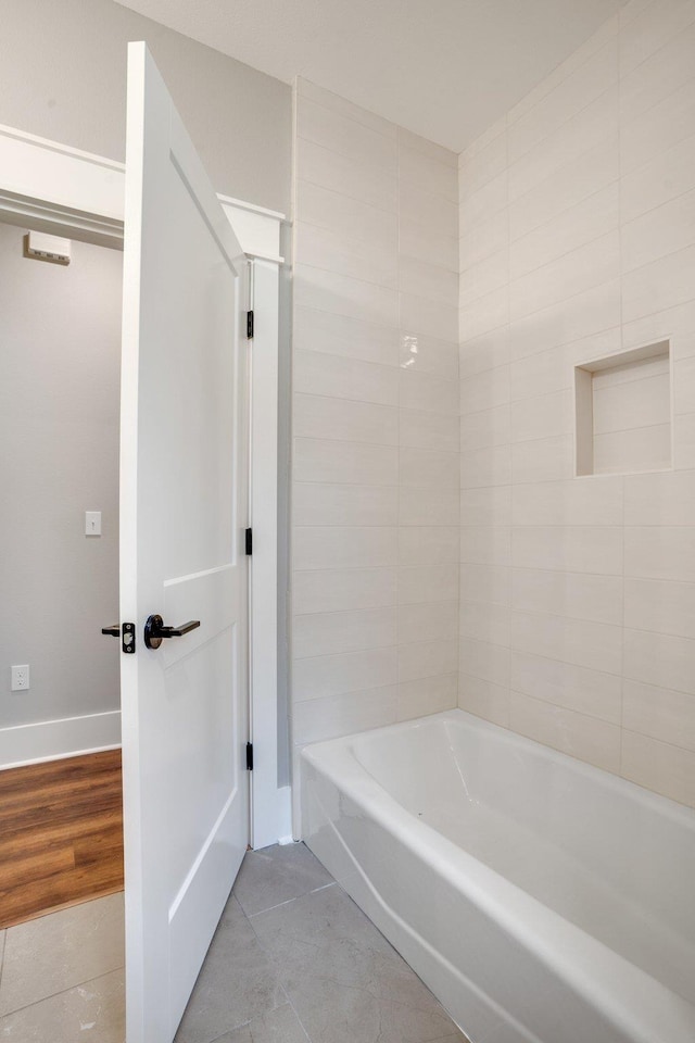 bathroom featuring tile patterned flooring