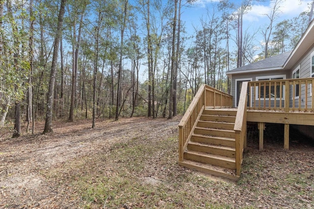 view of yard featuring a wooden deck